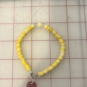 Yellow smiley face bracelet